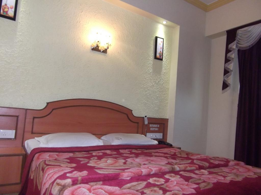 Hotel Ravikant Poona Kamer foto